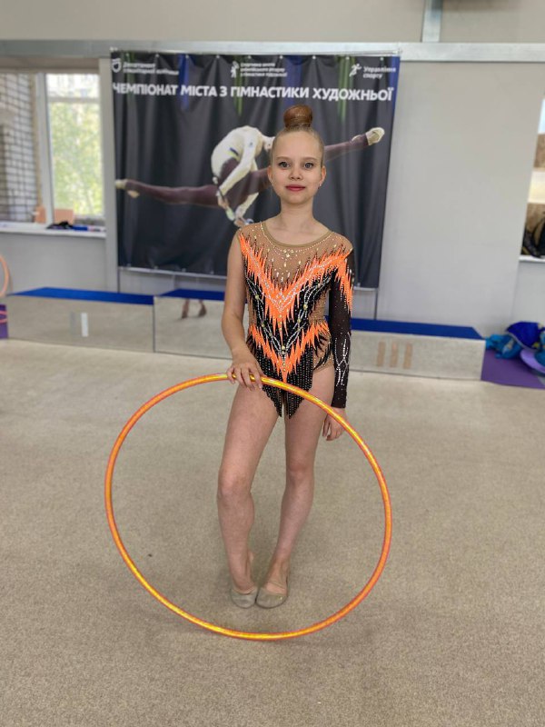 Чорно-помаранчевий купальник з зигзагом — виступ | р. 134